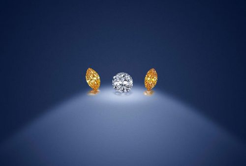 Fancy-Coloured Diamond Three-Stone ring