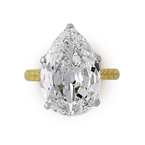 A 4.42ct old-cut pear shape diamond solitaire ring with engraved gold band £60,000